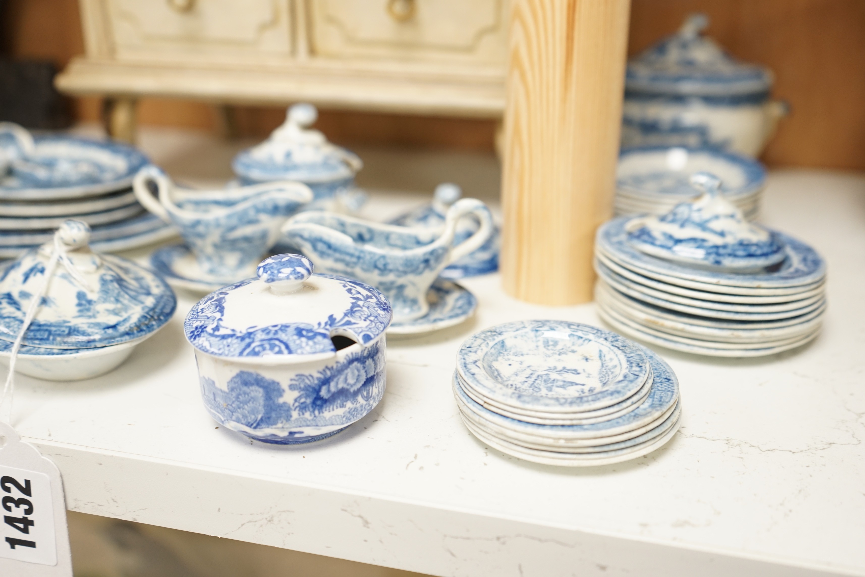 A Victorian toy-size blue and white dinner service and a painted wooden miniature chest, chest 27cms high